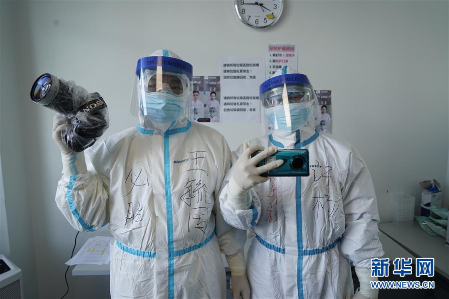 (新华全媒头条配图·图文互动)(15)战“疫”的一天——新华社记者直击湖北保卫战