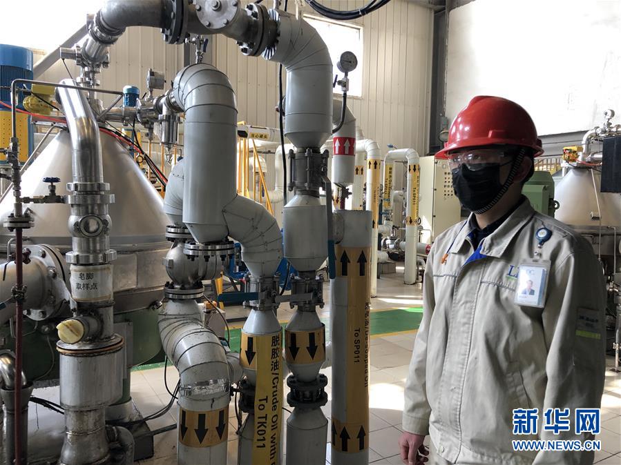 (图文互动)(2)同心战“疫”传递中国信心——外企复工复产一线见闻