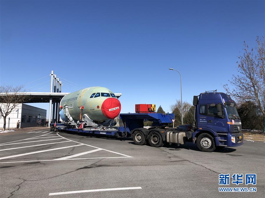 (图文互动)(6)同心战“疫”传递中国信心——外企复工复产一线见闻