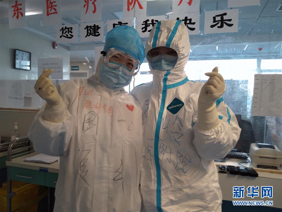 (一线抗疫群英谱·图文互动)(1)志坚人自勇 国安家无恙——山东护师张岭“舍”家战“疫”