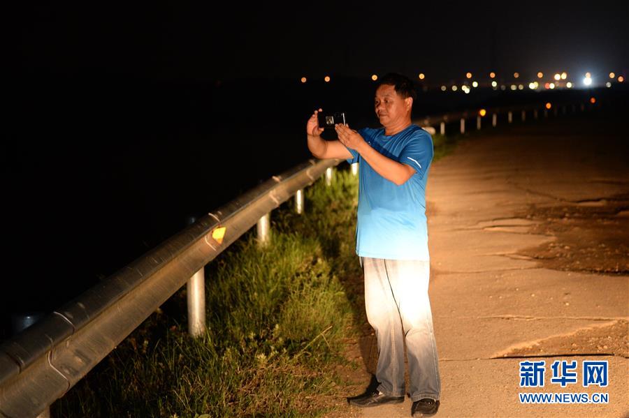 （图片故事）（6）环保志愿者章志标的绿水青山梦