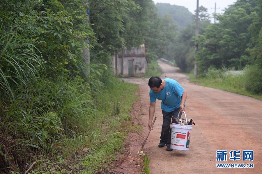 （图片故事）（7）环保志愿者章志标的绿水青山梦