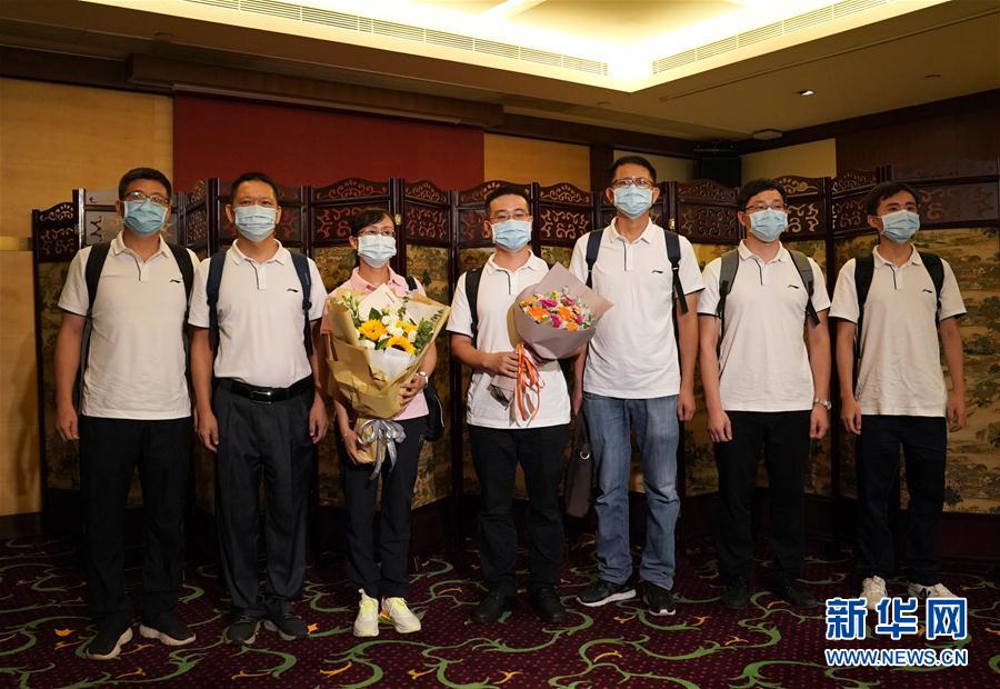 (图文互动)(3)“内地核酸检测支援队”7名“先遣队”队员抵达香港