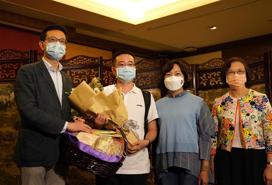 (图文互动)(4)“内地核酸检测支援队”7名“先遣队”队员抵达香港