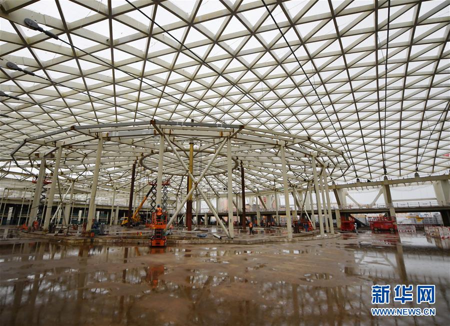（体育）（4）国家会议中心二期主体结构封顶