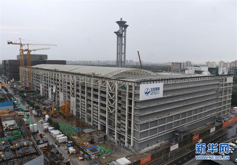（体育）（8）国家会议中心二期主体结构封顶