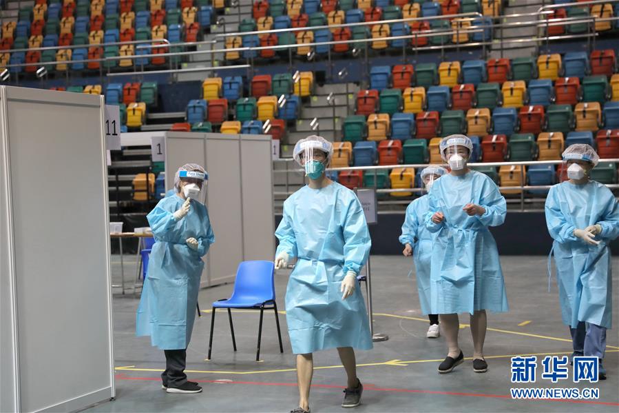 (图文互动)(2)“身为医护人员一分子,应该出来帮忙”——参与新冠病毒社区检测的香港医护人员速写