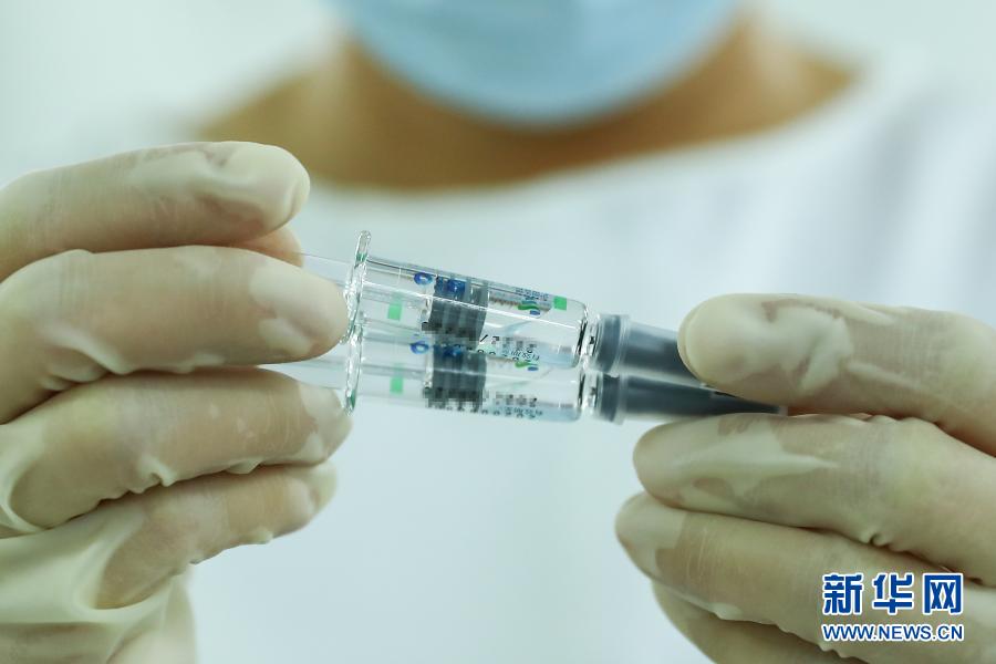 我国首个新冠病毒疫苗附条件上市 将为全民免费提供