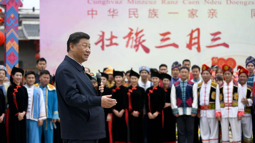 习近平：建设新时代中国特色社会主义壮美广西