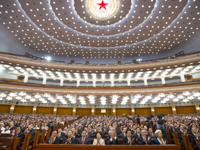 把国家民族命运握在人民手中