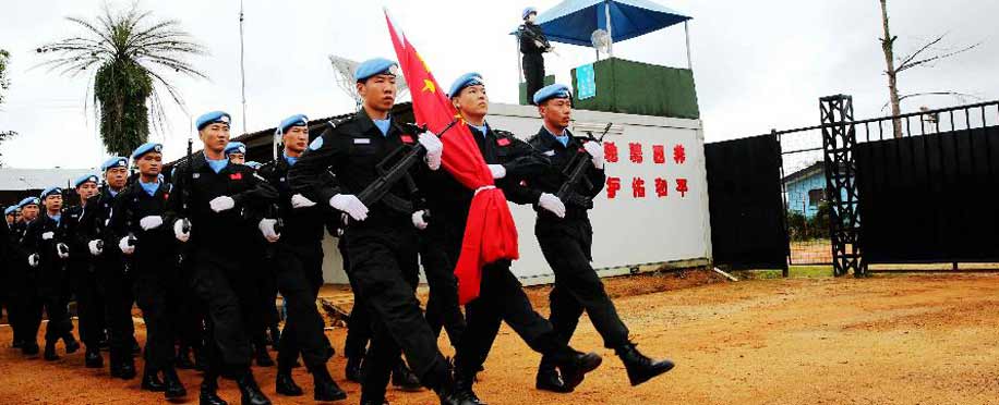 中国驻利比里亚维和警察防暴队举行升国旗仪式