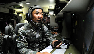 记北京军区某机步团团长满广志