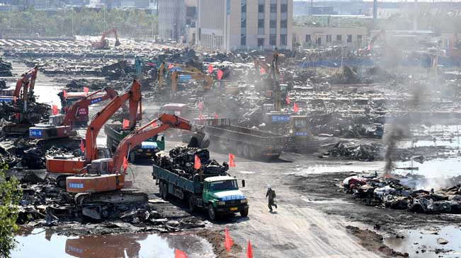 核心区及周围仍有着火点 现场清理工作继续