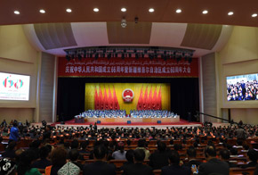 庆祝中华人民共和国成立66周年暨新疆维吾尔自治区成立60周年大会隆重举行