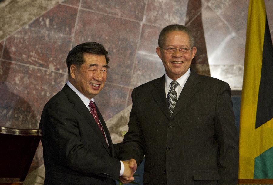 回良玉同牙买加总理戈尔丁举行会谈