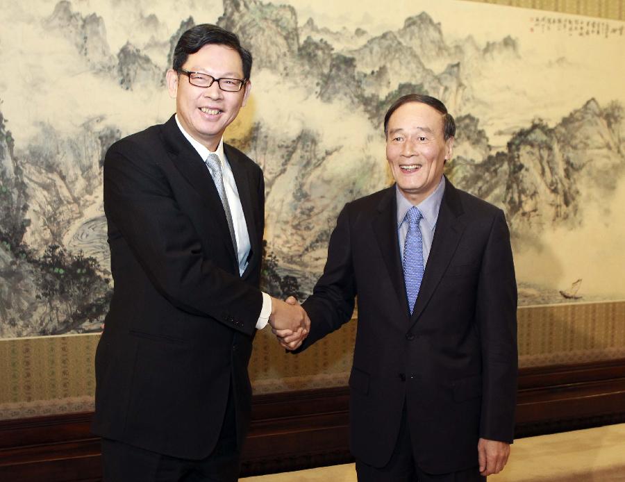 王岐山会见香港银行公会代表团