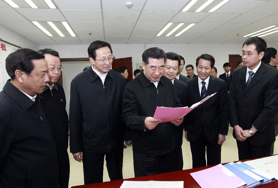 回良玉在农民日报社考察调研