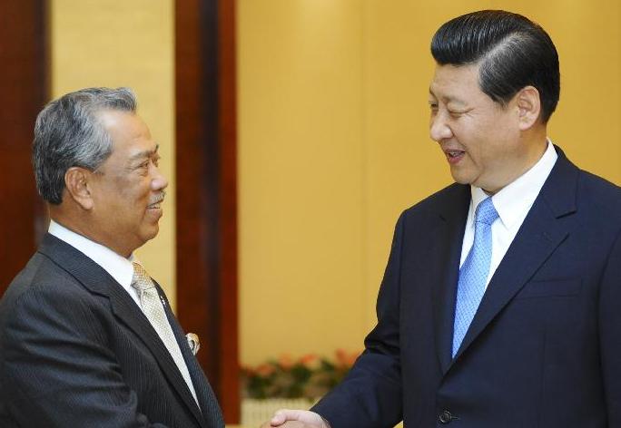 习近平会见马来西亚副总理毛希丁