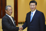 习近平会见马来西亚副总理毛希丁