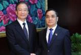 温家宝同老挝总理通辛举行会谈