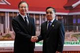 温家宝与老挝总理通辛共同出席老挝国际会议中心启用仪式