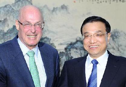 李克强会见美国前财政部长保尔森