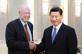 习近平会见美国前财政部长保尔森