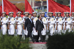 习近平举行仪式欢迎法国总统奥朗德访华