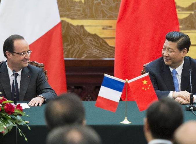 习近平同奥朗德共同会见记者