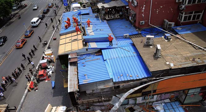 北京西城&ldquo;空中违建棚户区&rdquo; 拆除 出入全靠采光窗