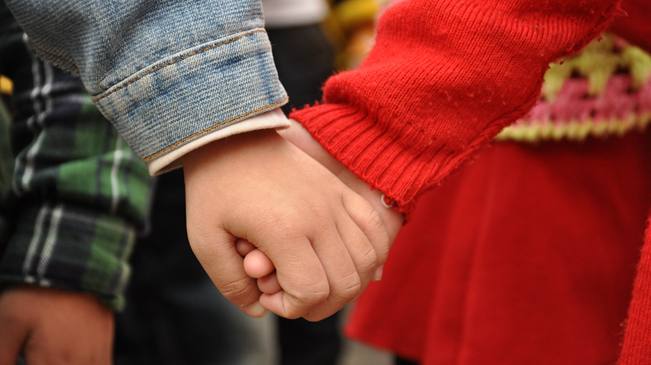 动新闻|关心留守女童 一起守望花蕾