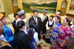 习近平会见基层民族团结优秀代表