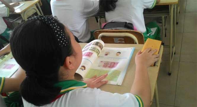 广州中小学全国首开金融理财课