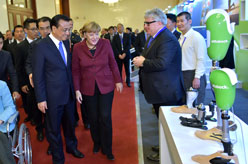 李克强同德国总理默克尔共同出席亚欧会议框架下残疾人合作暨全球辅助器具产业发展大会