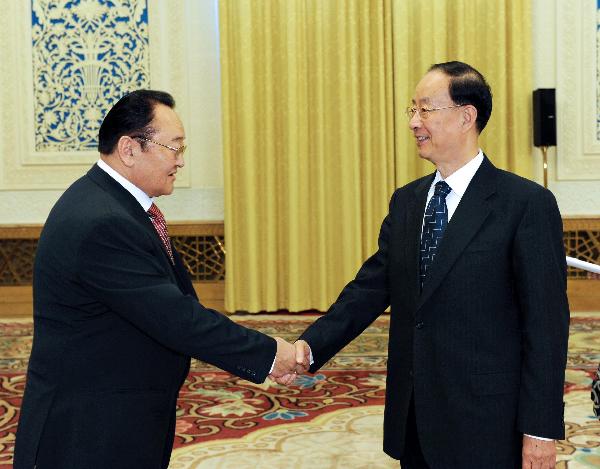 何勇会见蒙古人民革命党监督总委员会代表团