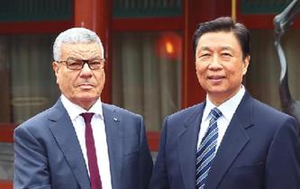 李源潮会见阿尔及利亚民族解放阵线党代表团