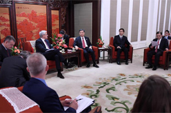 汪洋会见比利时副首相