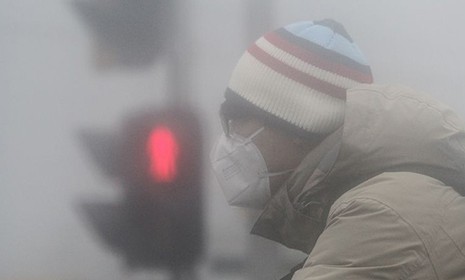 雾霾天忌烟酒别飙歌 学会正确呼吸