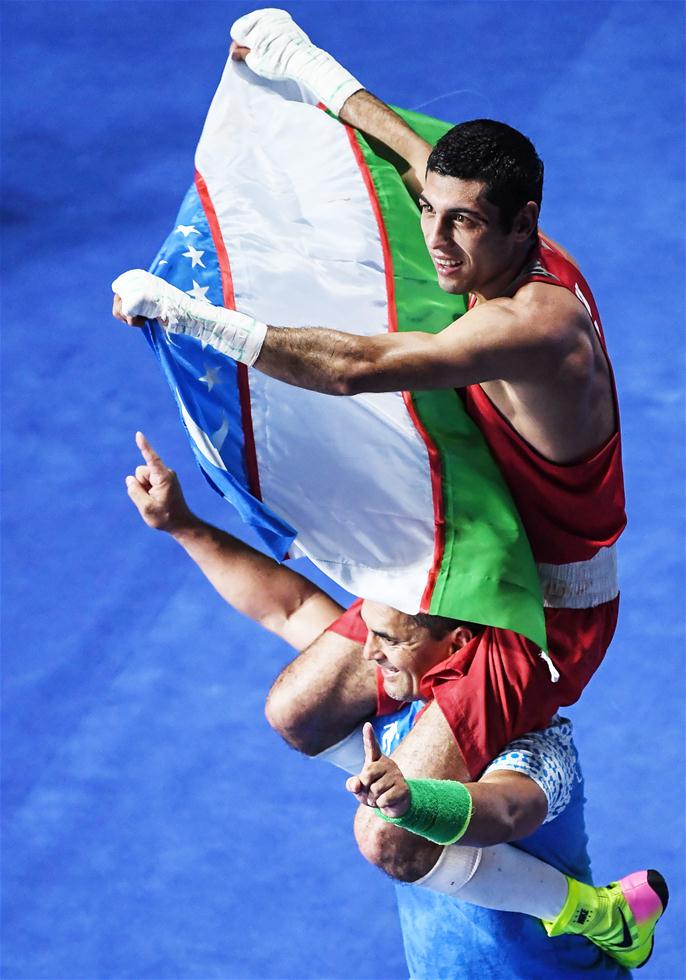 拳击男子52公斤级：乌兹别克斯坦选手夺金