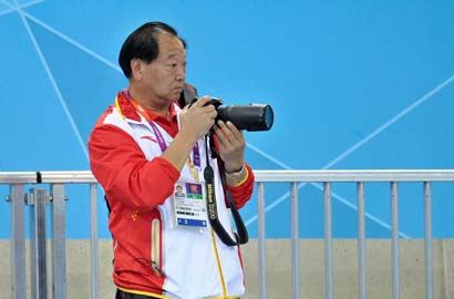 奥运会多棱镜：许海峰客串摄影师