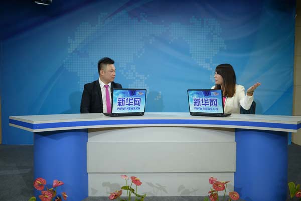 薛学军做客新华网