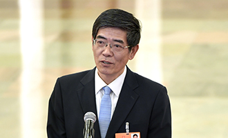 中国残疾人联合会执行理事会理事长鲁勇接受采访