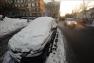 俄罗斯遇异常严寒 汽车被雪冻住