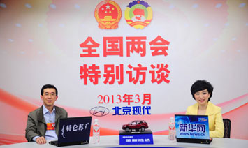 全国农工民主党中央副主席、南京邮电大学校长杨震做客新华网