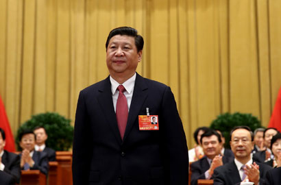 习近平向全场代表致意