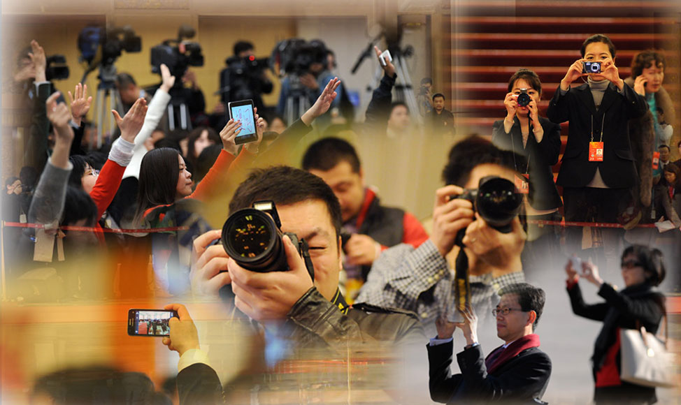 两会趣图百态：&ldquo;镜头中看镜头&rdquo;&ldquo;相机中的战斗机&rdquo;