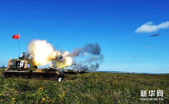 中俄联合反恐军事演习进行实兵实弹协同训练