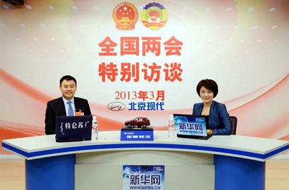 姜明做客新华网两会访谈