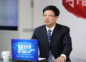 周明春在访谈现场