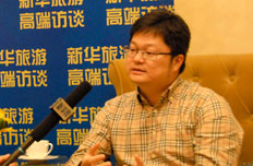 三亚海棠湾管委会旅游局局长叶凯中接受采访